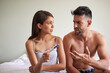 © peopleimages.com - Woman, man and waiting for pregnancy test with anxiety, together and frustrated in bedroom or house. Couple, reading and results as nervous for news, information and announcement as family planning