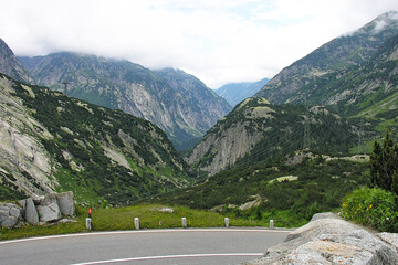 Wall Mural - Huge mountain range and a road, the Grimsel Pass, Switzerland