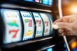 © Konstiantyn Zapylaie - Excitement of winning at slot machines in a vibrant casino environment
