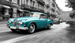 © Sergey Kohl - Classic car driving on a street lined with traditional buildings, with a blurred background suggesting motion and speed. Illustration by Generative AI.