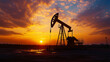 © ImageKing - A large pump used in oil production is working at an oil field as the sun sets.