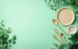 © Georgii - Eco-friendly tableware arrangement with biodegradable utensils and greenery on light green background
