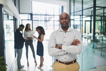 Poster - Crossed arms, office and portrait of business black man for confidence at work, career and job with team. Serious, corporate manager and person for professional mindset, company growth and success