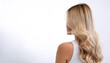 © SaddhaVisual - blonde hair in back side on side position provides copy space for text. background concept isolated white