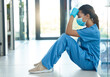 © CineLens2024/peopleimages.com - Sad, woman and doctor with stress at hospital for surgery mistake, medical crisis and depression of burnout. Tired, female surgeon and anxiety with healthcare news, accident trauma and emergency risk