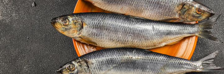 Herring fresh fish seafood pescetarianism tasty food dish fresh delicious gourmet food background on the table rustic food top view copy space top view keto and paleo diet vegetarian