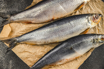 Herring fresh fish seafood pescetarianism tasty food dish fresh delicious gourmet food background on the table rustic food top view copy space top view keto and paleo diet vegetarian