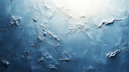 Fototapete - A textured blue wall features a rough, uneven surface gently illuminated by soft light, creating a calming atmosphere in an indoor space.