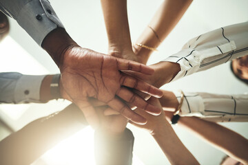 Wall Mural - Below, stack and hands of business people in office for teamwork, collaboration and support. Professional, corporate staff and men and women with gesture for solidarity, partnership and agreement