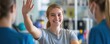 © Aurora - A young woman smiles while raising her arm during a physical therapy session with healthcare professionals, emphasizing recovery and support in a clinical setting.