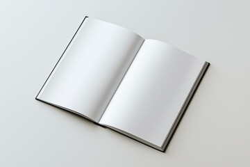 An empty open notebook rests on a plain surface, ready for thoughts and ideas to be captured