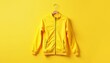 © SwathiFX - Bright and cheerful yellow jacket against a vibrant yellow background