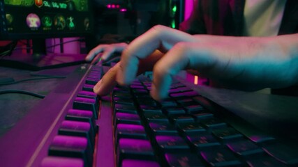 Close up hands man unrecognizable male typing gamer streamer hacker programmer desktop computer code data keyboard work cyber sport addiction play video game neon light studio pc mouse networks guy