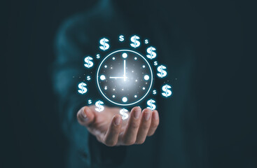 Time management concept, businesswoman holding clock and money icon on interface virtual for business time management. Time is money, work planning increases efficiency and reduces work time.