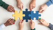 © hisilly - Colorful Business Team Solving Jigsaw Puzzle: Young People Connect Pieces on White Table - Teamwork Concept Banner with Copy Space