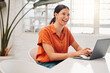 © KayExam/peopleimages.com - Woman, happy and typing with laptop in office for planning, inspiration and story at media company. Person, writer and excited with computer for article, feedback and newsletter at creative agency