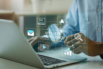 affiliate marketing, online business model concept. man holding a magnifying glass with virtual scre