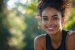 © Dhriti - Smiling woman athlete taking a break during workout, Generative AI