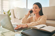 © DavisShared/peopleimages.com - Woman, laptop and phone call in home with studying, elearning and online university with talk. Research, education and mobile chat with internet, diary and planning for exam with web planner on couch