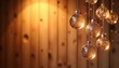 © LarisaM - Transparent Christmas baubles with golden sparkle representing holiday magic against warm wooden backdrop
