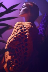 Sticker - Stylish Portrait of a Woman in Orange Knitted Shawl Surrounded by Plants in a Purple Lighting - Ideal for Fashion and Lifestyle Use