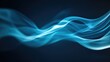 © savittree - Abstract blue smoke swirling against a dark background