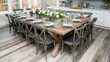 © PowerforUs - Rustic Wooden Farmhouse Dining Table with White Flowers and Black Chairs
