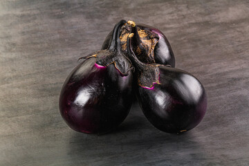 Raw violet and black eggplant