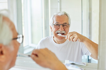 Wall Mural - man tooth bathroom toothbrush hygiene senior morning routine brushing toothpaste care dental elderly
