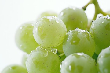 A close-up shot of fresh green grapes