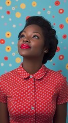 Wall Mural - A woman with red hair and a red shirt is looking up at the camera. The image has a bright and cheerful mood, with the woman's red hair and the red shirt adding to the overall color scheme