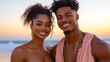 © JVLMediaUHD - Happy Couple Enjoying a Sunset Together on a Beach, Embracing Love and Connection in a Picturesque Coastal Setting