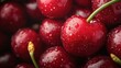 © Maximages  - This image captures a group of cherries with droplets enhancing their glossy surface, symbolizing freshness, abundance, and vivacity, perfectly embodying summer's bounty.