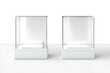 © RM Graphics - White glass showcase cube mock up, isolated, 3d rendering. Empty acrylic podium box mockup