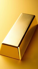 Close-up of a shiny gold bar on a golden background, symbolizing wealth, investment, and luxury in a visually striking image.