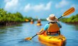 © Autaporn - A serene kayaking adventure through lush mangroves under a bright blue sky, perfect for nature lovers and outdoor enthusiasts.