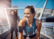 © SunriseDon/peopleimages.com - Woman, break and outdoor for fitness, running and urban town for thinking on sports training. Female person, city and athlete on street for exercise, marathon inspiration and workout rest on road