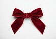 © Alexandra - Elegant red velvet bow lying on a white background