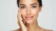 © KATERYNA - Woman Portrait with Clear Skincare in Studio. Healthy Beauty and Hands Touching Smooth Skin on White Background