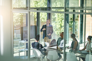 Poster - Business, people or tech in boardroom for conference, brand management or feedback chart. Man speaker, team or corporate presentation in office for company growth, explain or group performance review