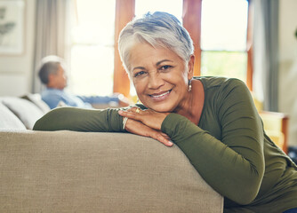 Poster - Portrait, home and senior woman on sofa, relax and happiness with weekend break. Face, pensioner and apartment with old couple, comfortable and retirement with smile, calm and cheerful in lounge