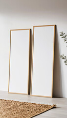 Two tall wooden frames leaning against a wall, illuminated by natural light, perfect for a minimalist interior.