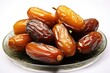 © SNK - A variety of fresh date fruits arranged gracefully on a decorative plate highlighting their rich colors and unique textures in an inviting presentation