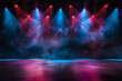 The stage of the concert is illuminated with colorful spotlights. Dark background, copy space concept.