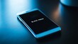 © Fotoksa - A contemporary smartphone on the table, showcasing dark screen with text 'Black Friday' under soft ambient lighting close up