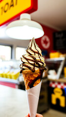 Canvas Print - soft serve ice cream cone with chocolate drizzle