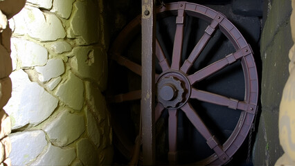 Vintage Coal Mining. An old Victorian mining wheel at the head of a now disused coal mine in Wales, UK.