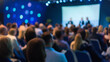 © N7 - Business Conference with Focused Speaker - A business conference where the speaker is in focus and the audience is blurred.