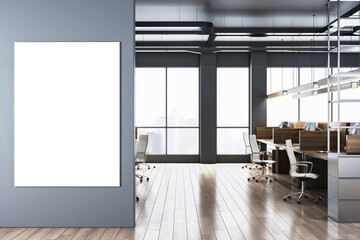 Wall Mural - Modern office interior with blank poster on wall and large windows overlooking city. 3D Rendering