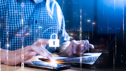 Wall Mural - person using laptop and smartphone with digital key icon symbolizing data security. binary code and 
